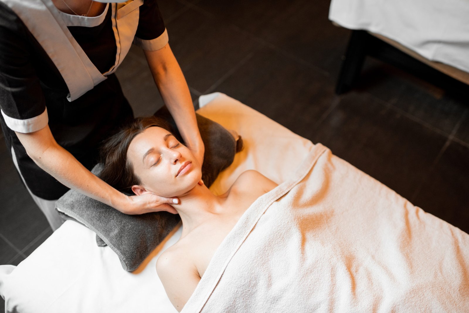 woman receiving neck massage in spa 2026 01 09 00 12 29 utc scaled