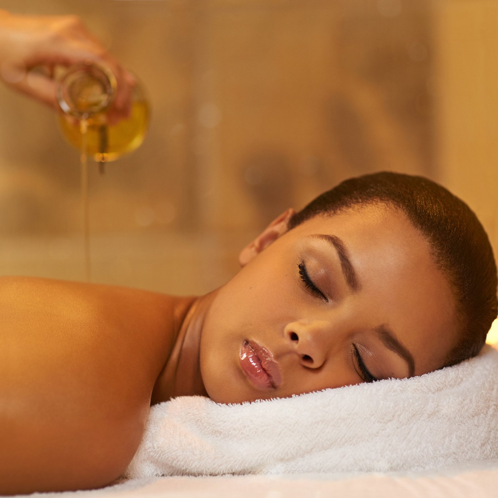 woman relaxing during oil massage at spa 2026 03 25 03 47 01 utc scaled